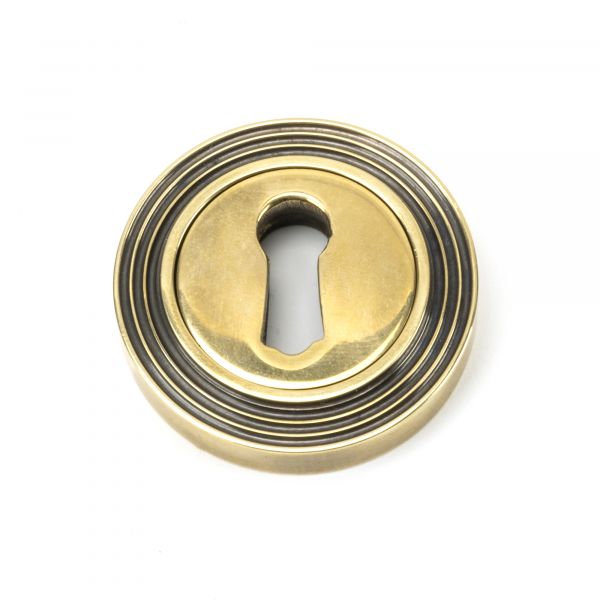 From the Anvil Aged Brass Round Escutcheon (Beehive)