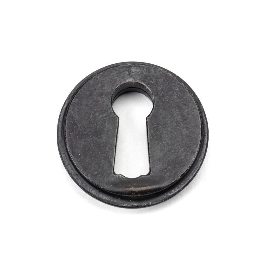 From the Anvil External Beeswax Round Escutcheon (Art Deco)
