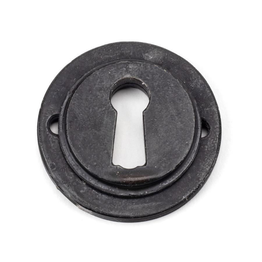 From the Anvil External Beeswax Round Escutcheon (Art Deco)
