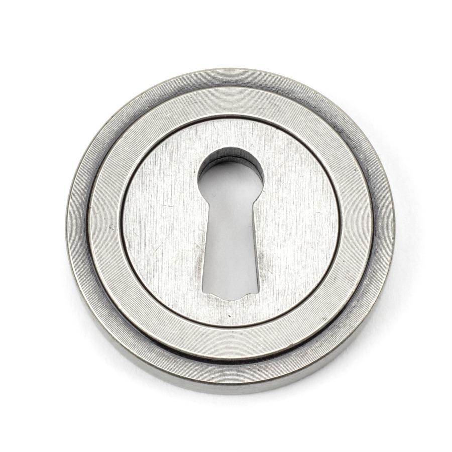 From the Anvil Pewter Round Escutcheon (Art Deco)