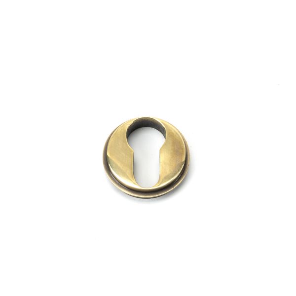 From the Anvil Aged Brass Round Euro Escutcheon (Plain)