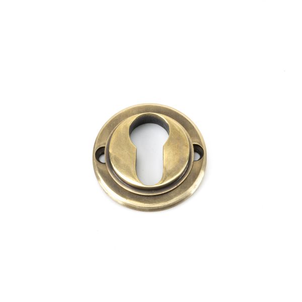From the Anvil Aged Brass Round Euro Escutcheon (Plain)