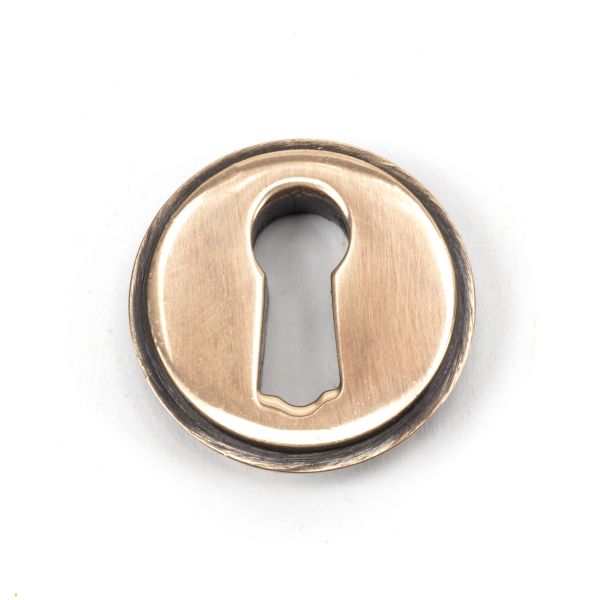 From the Anvil Polished Bronze Round Escutcheon (Beehive)