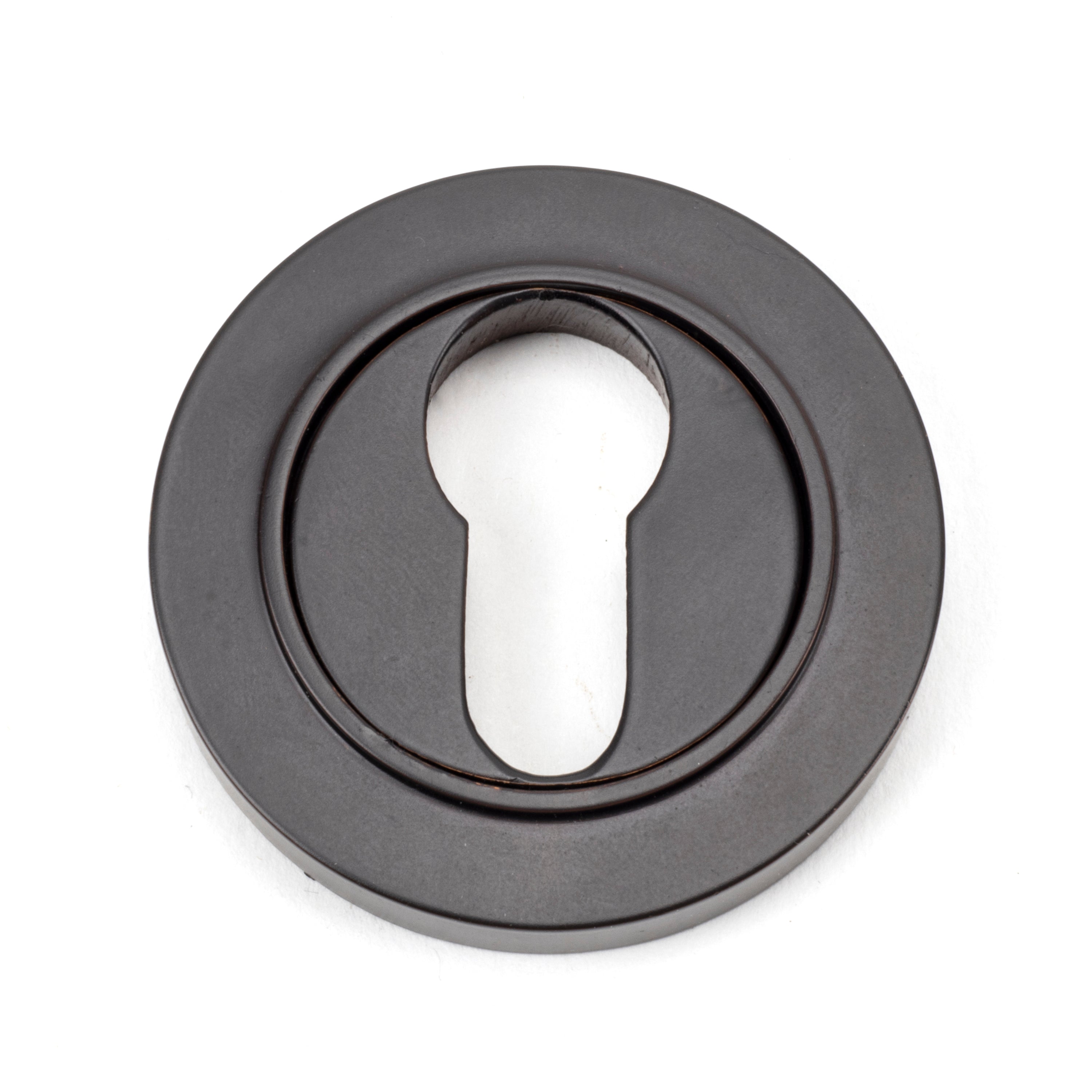 From the Anvil product code 46121 Aged Bronze Round Euro Escutcheon (Plain), available at No.42 Interiors. Free Delivery on orders over £50. Looking for from the anvil stockists near me, No.42 Interiors on Carter Street, Uttoxeter has a wide range of From the Anvil Ironmongery on display and available to buy in-store or order with the option of next day delivery. 