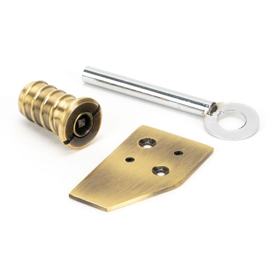 From the Anvil Aged Brass Key-Flush Sash Stop - No.42 Interiors