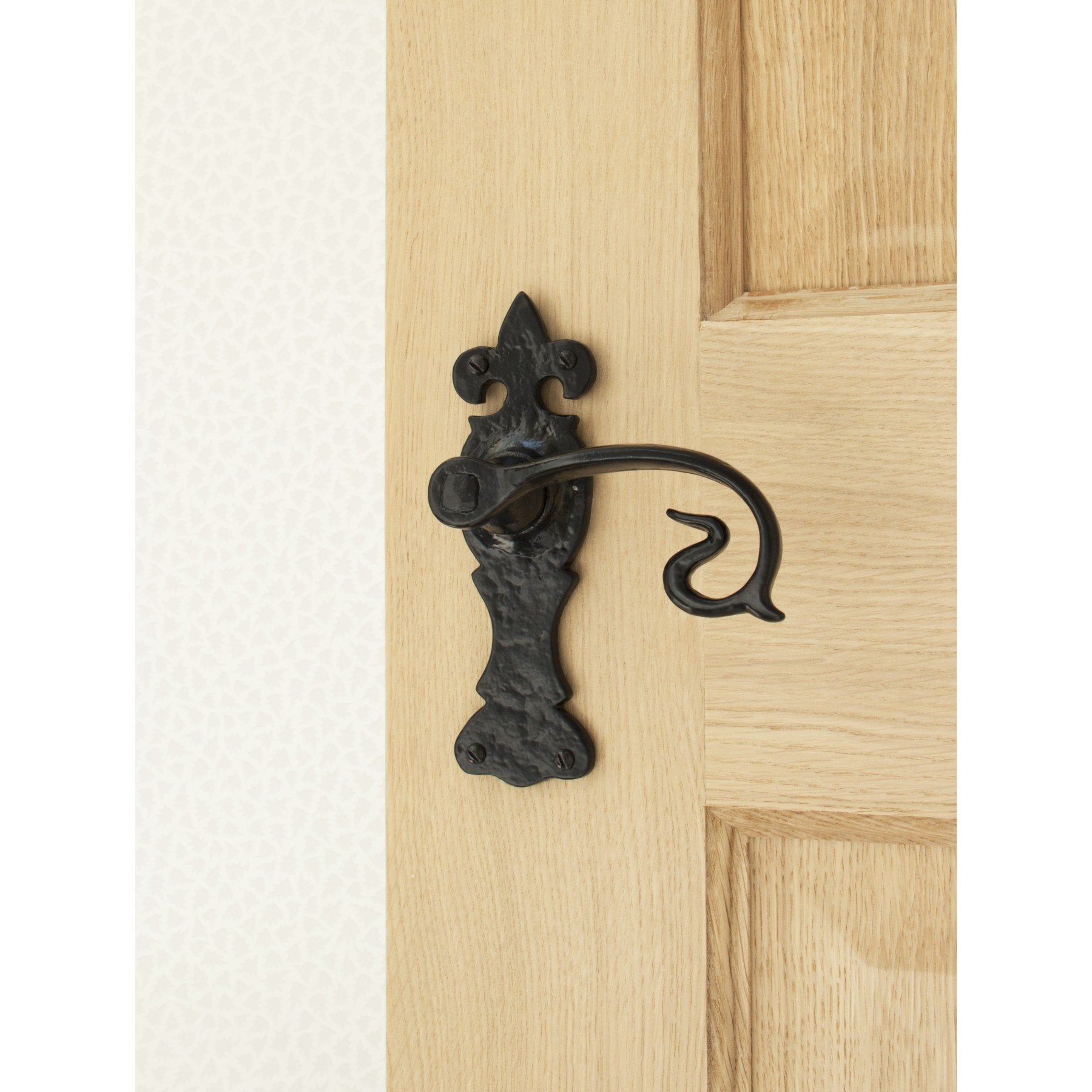 From the Anvil Black Curly Lever Latch Set